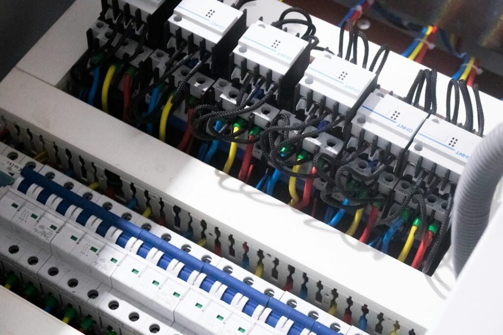 Industrial control panel with wired terminals and breakers