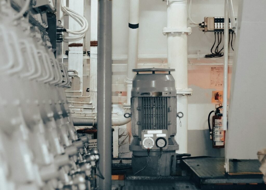 Industrial factory machinery monitored with vibration sensors